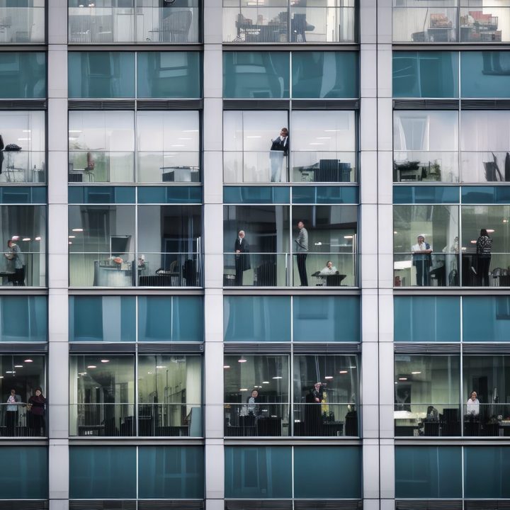Outside view of office building many window with business people working inside. Generative AI AIG18.